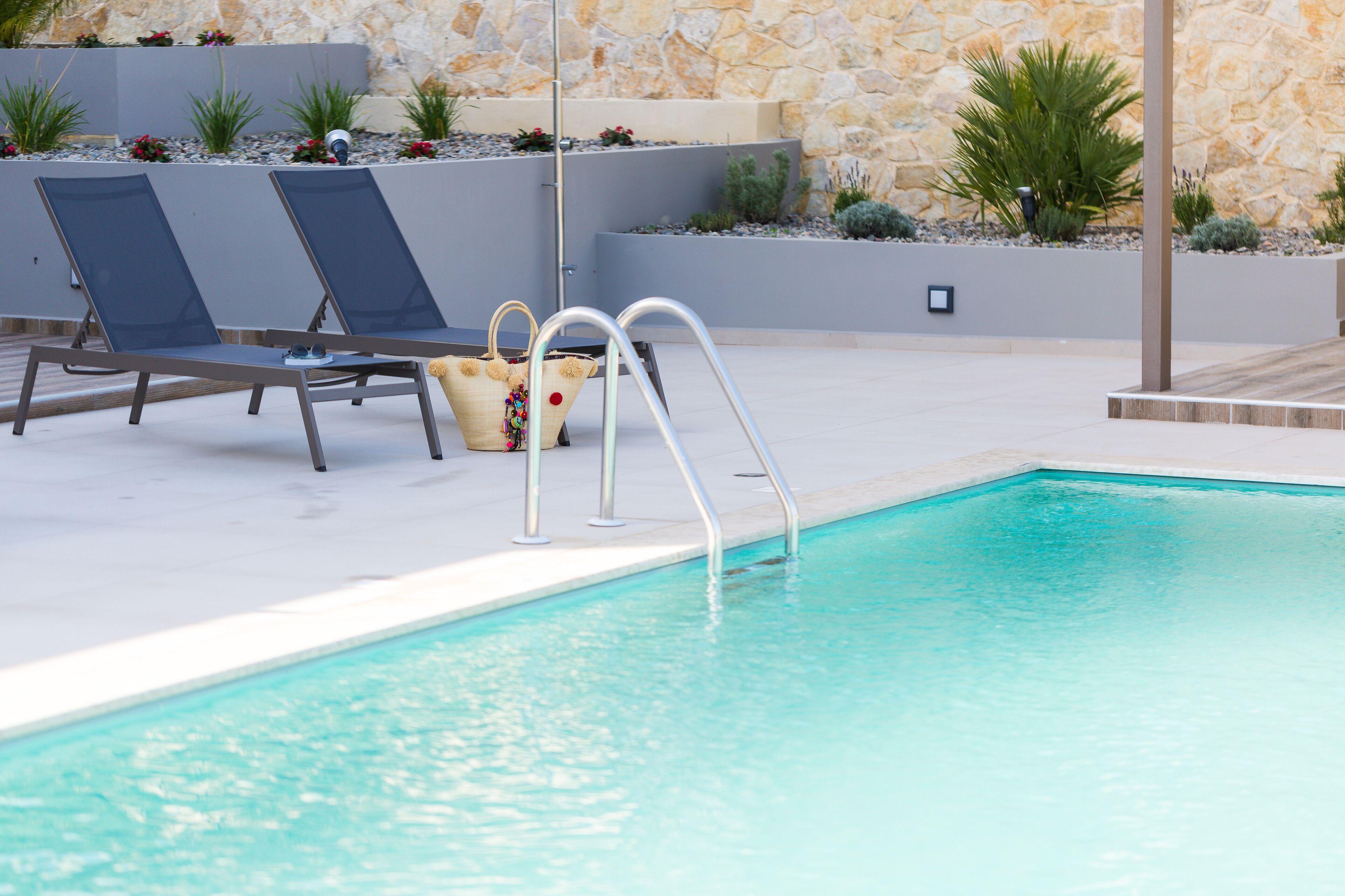 Outdoor pool, pool umbrellas, sun loungers