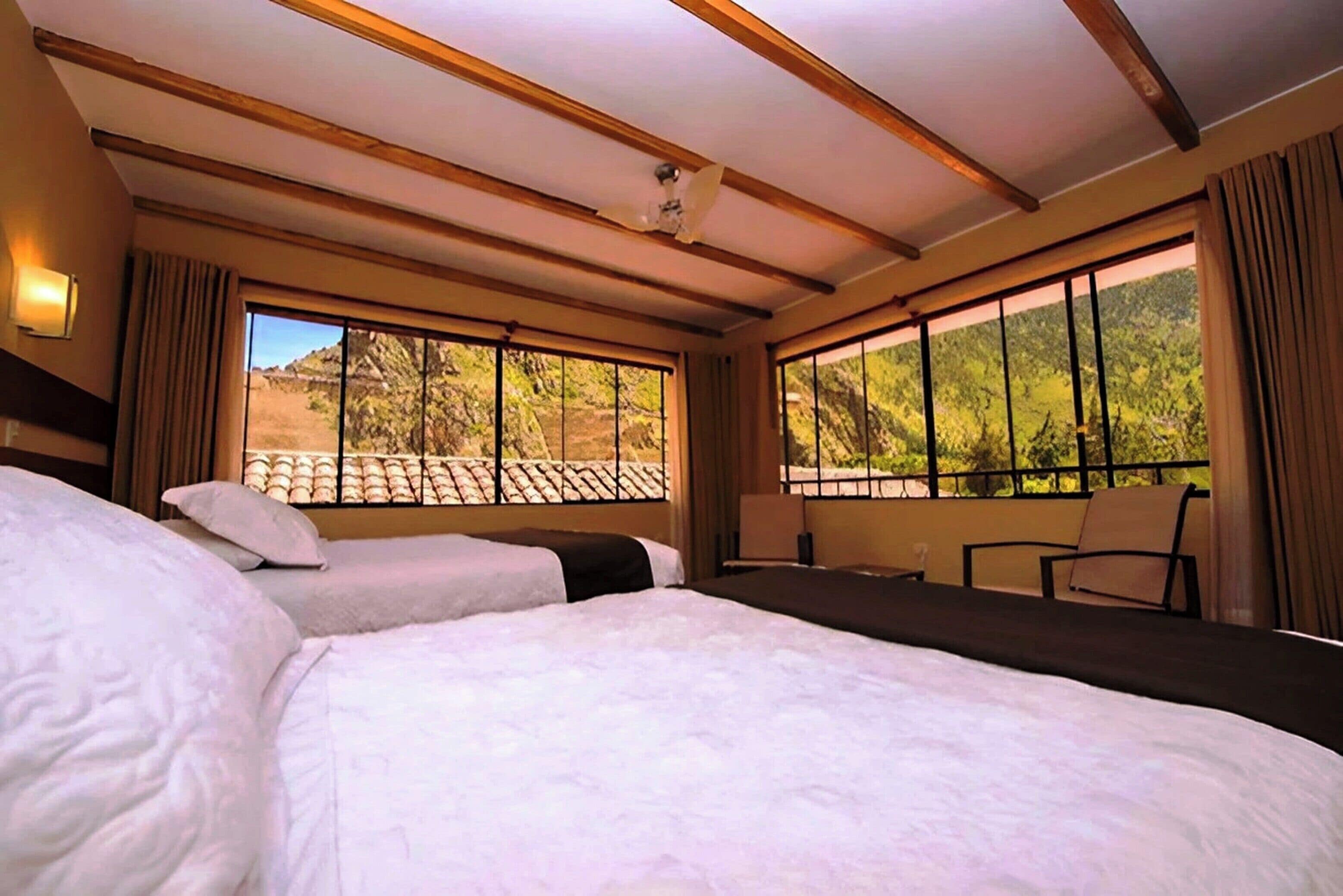 comfort triple room, garden area | premium bedding, down duvets, tempur-pedic beds, desk