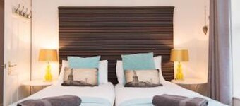 Luxury 5 bed house near to City Centre and Beaches. Sleeps 12, outside courtyard