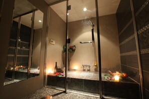 A modern bathroom with a glass shower enclosure, a marble countertop, and a mirror. - HOTEL GRASSINO URBAN RESORT UTSUNOMIYA - Adult Only (Utsunomiya)