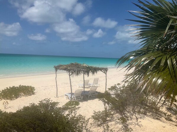 On the beach, sun-loungers, beach towels