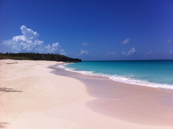On the beach, sun-loungers, beach towels