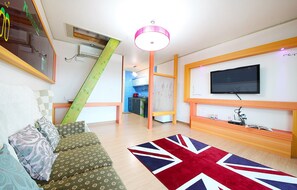 Premium-huone | Oleskelualue | Taulutelevisio