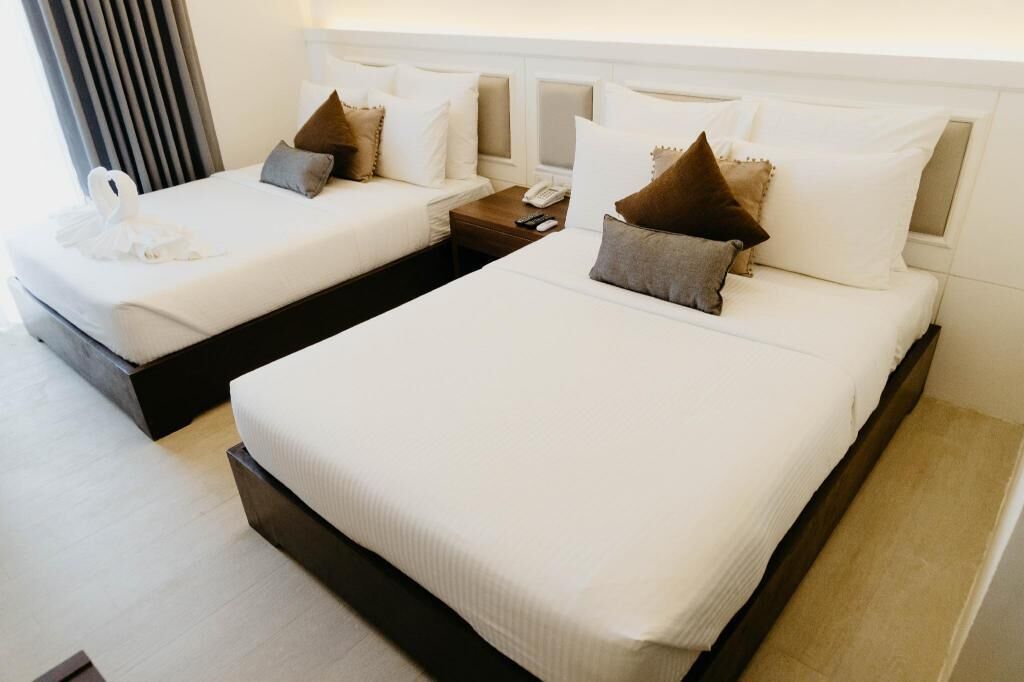 Coffres-forts dans les chambres, Wi-Fi gratuit, draps fournis