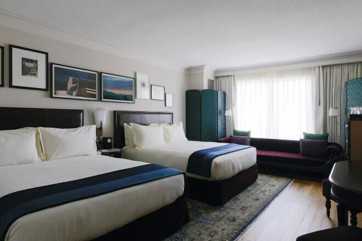 Premium bedding, down comforters, pillowtop beds, minibar