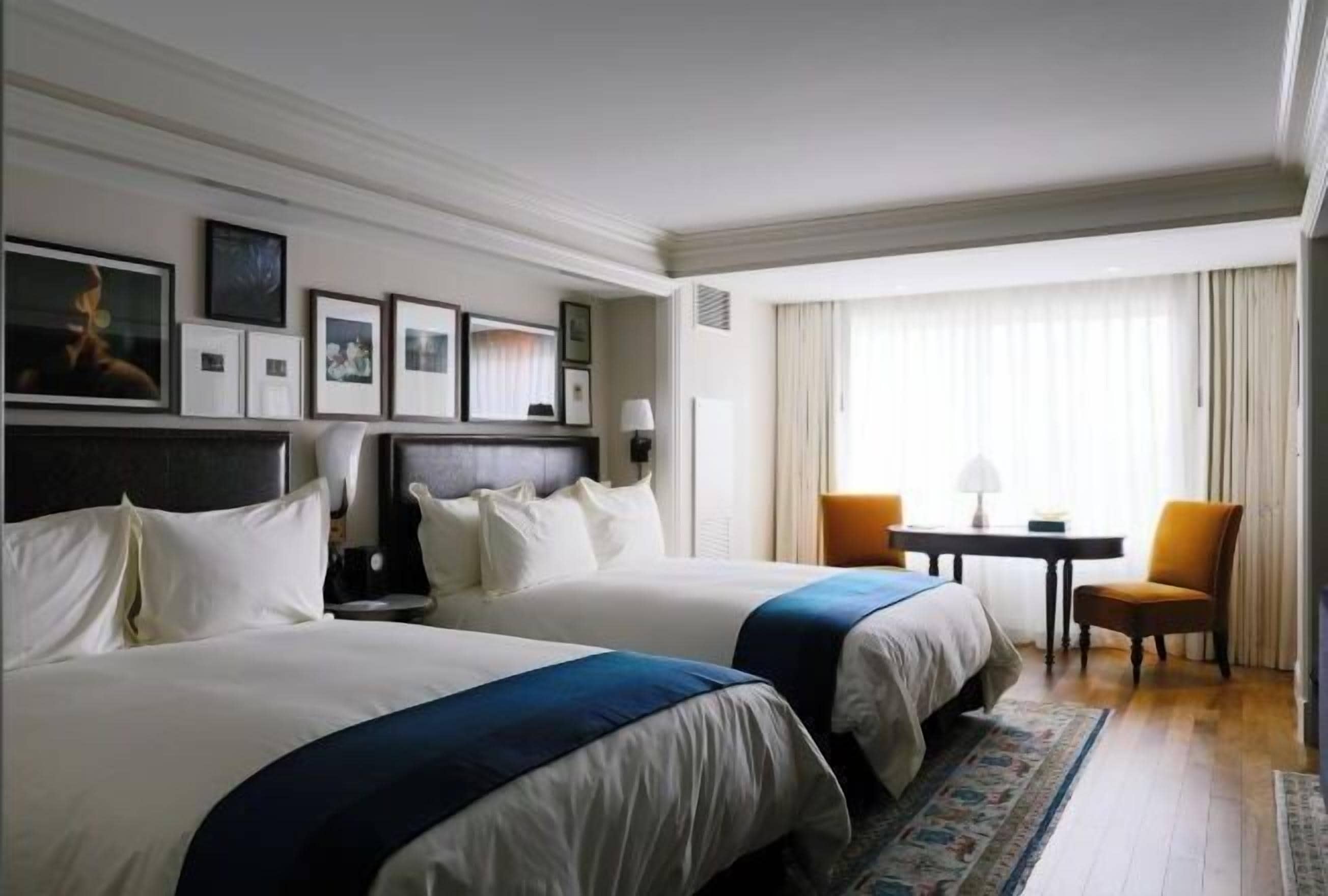 Premium bedding, down comforters, pillowtop beds, minibar