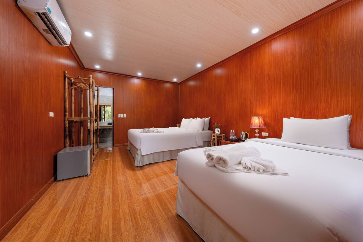 Executive Bungalow | Minibar, blackout drapes, WiFi (free), bed sheets