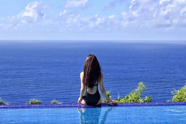 Deluxe kamer, uitzicht op zee | Een kluis op de kamer, gratis wifi