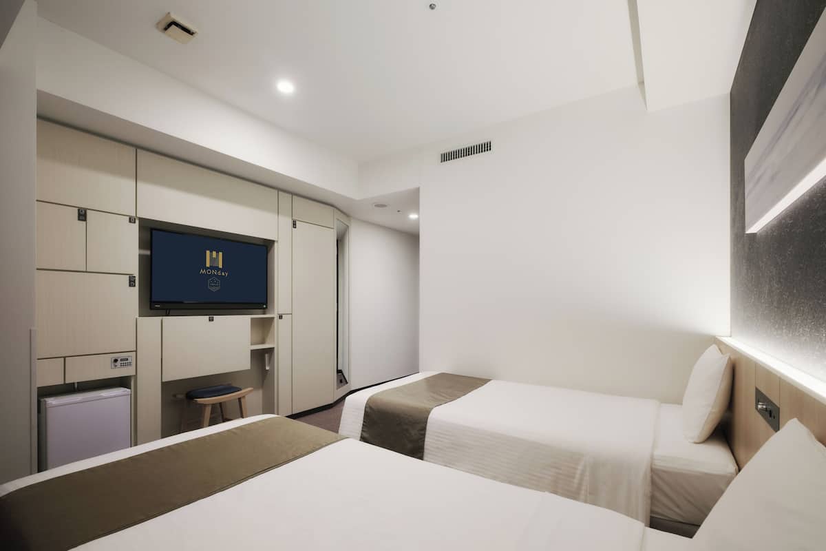 Kahden hengen deluxe-huone (kaksi sänkyä) | Tallelokero huoneessa, pimennysverhot, ilmainen Wi-Fi, vuodevaatteet