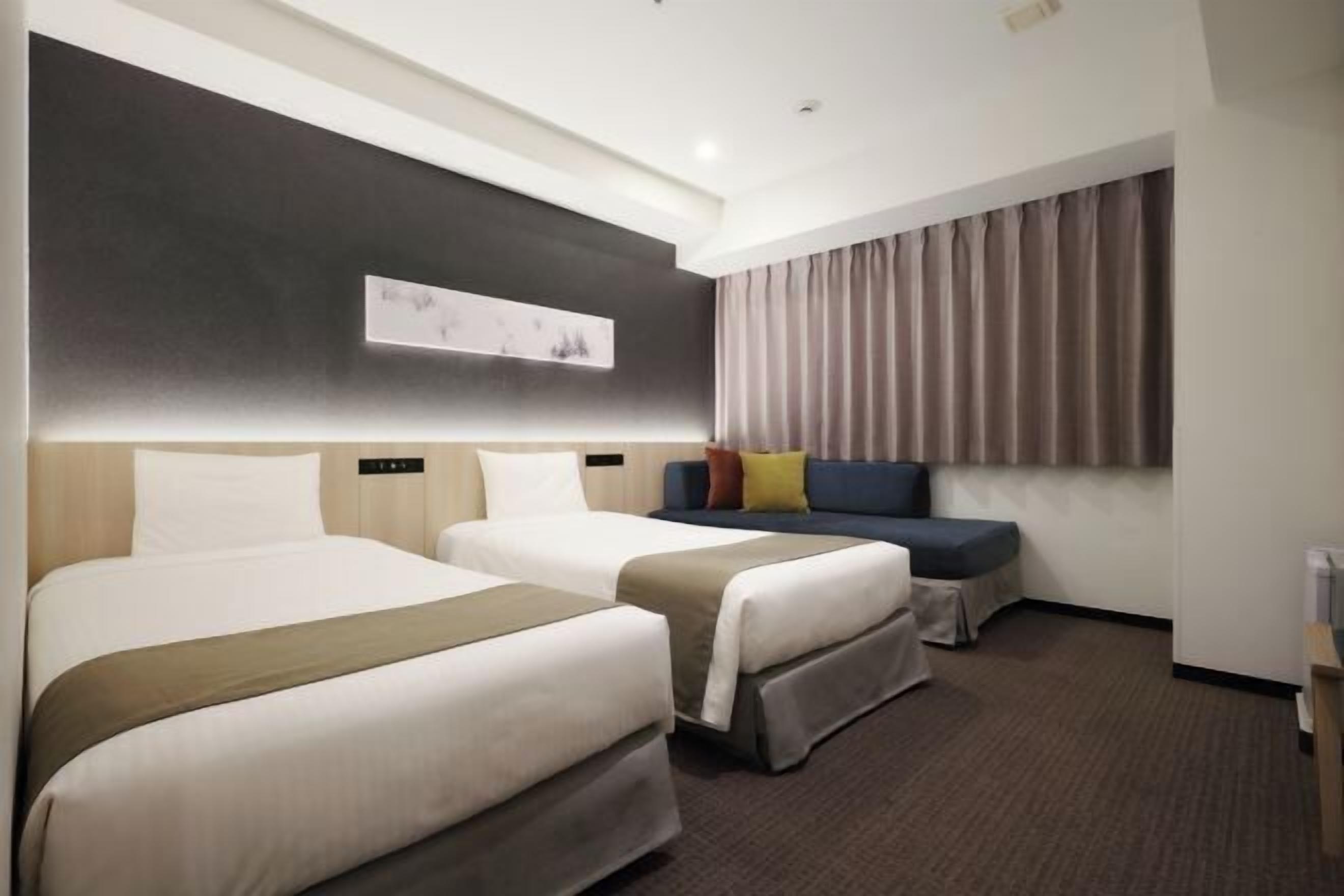 خزنة داخل الغرفة وستائر تعتيم وواي فاي مجانًا وملاءات أسرّة