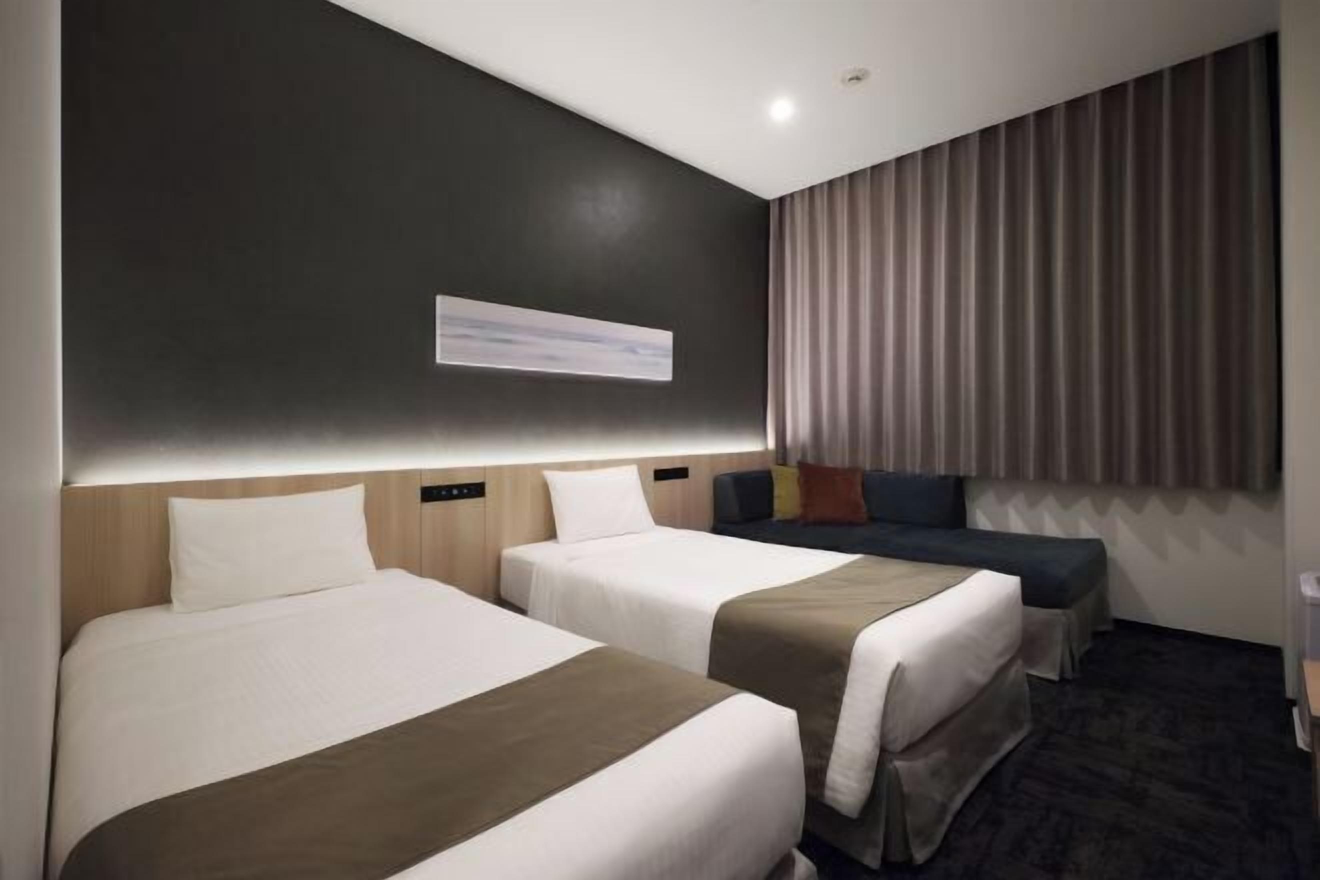 خزنة داخل الغرفة وستائر تعتيم وواي فاي مجانًا وملاءات أسرّة