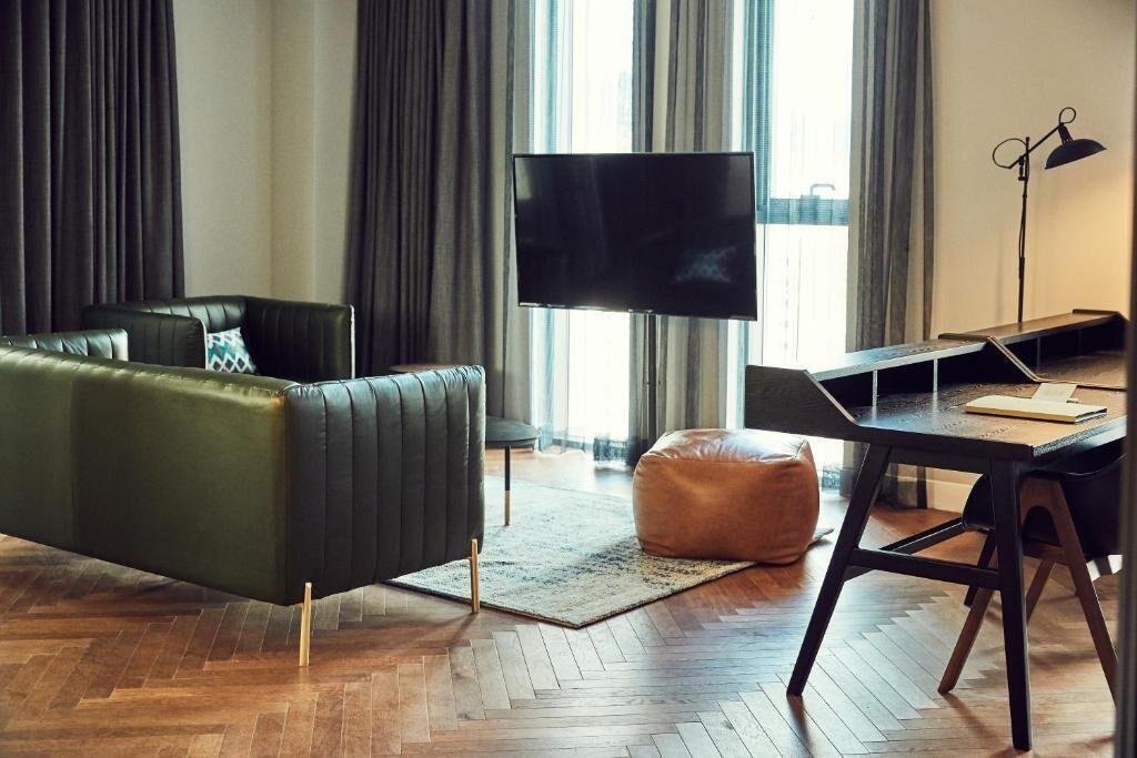 lacasa suite | living area | flat-screen tv, ipod dock