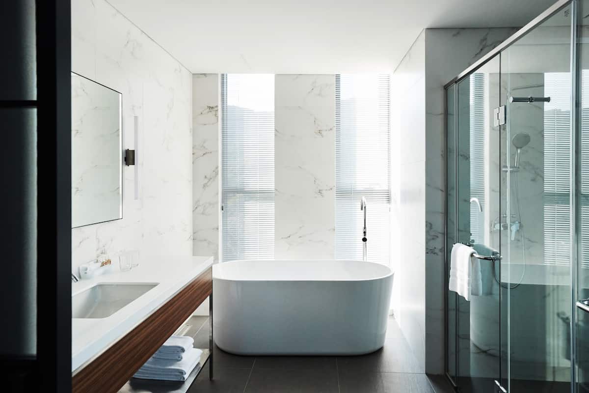 hair dryer, bathrobes, slippers, towels