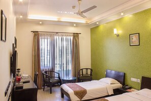 Superior Room | Egyptian cotton sheets, premium bedding, minibar, in-room safe - Enkay Residency JCM (Gurugram)