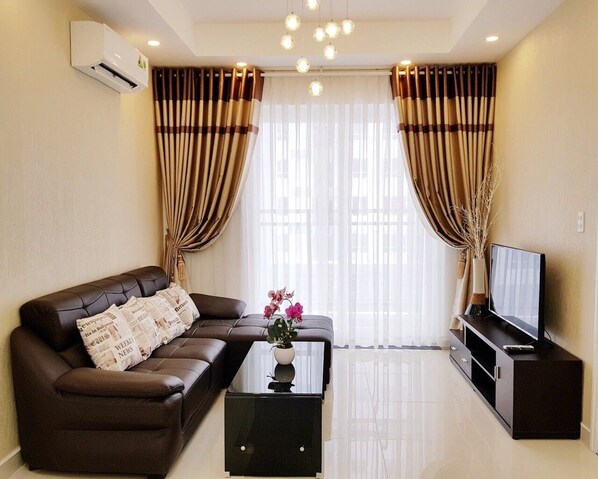 Lägenhet - 2 sovrum | Vardagsrum | Platt-tv