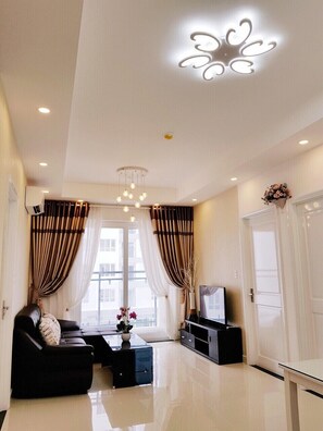 Lägenhet - 2 sovrum | Vardagsrum | Platt-tv