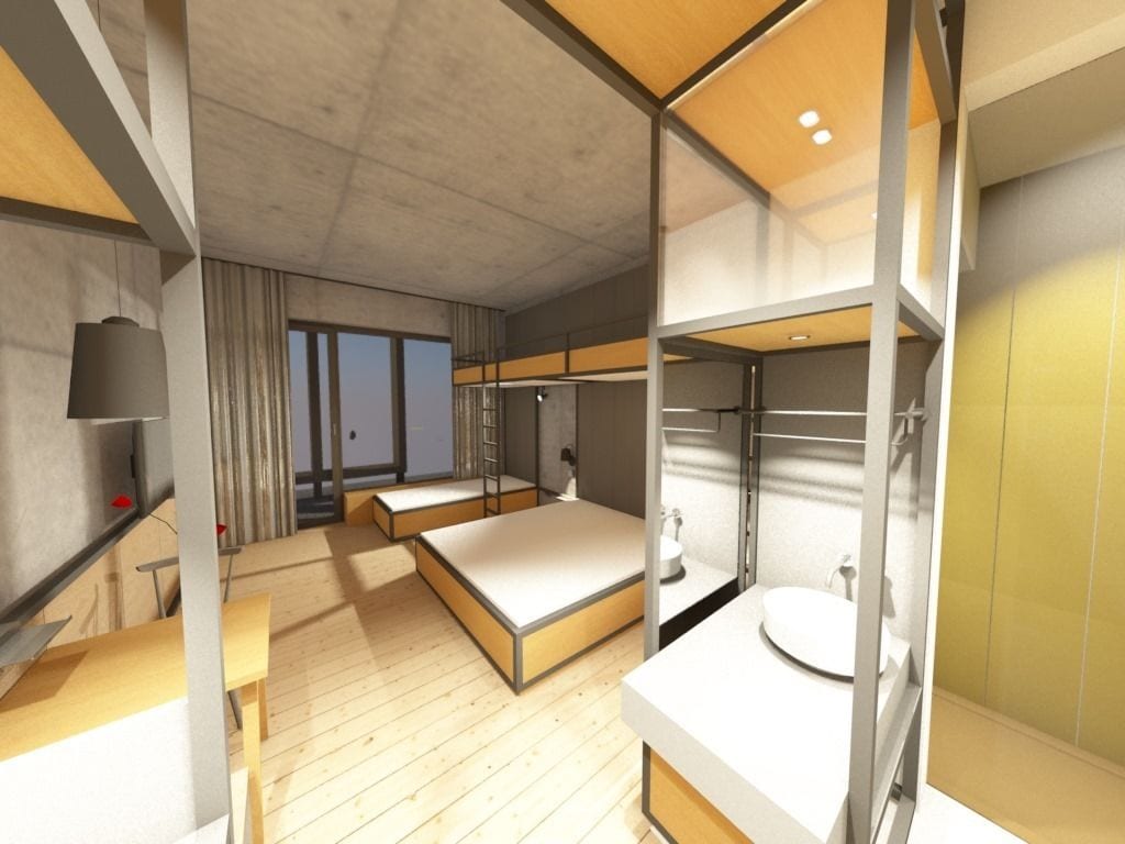 Ein modernes Hotelzimmer mit Stockbett, kleinem Schreibtisch, Nachttisch und einem Badezimmer mit Waschbecken und Spiegel.