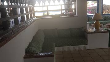 Apartment, 2 Bedrooms | Living area | Flat-screen TV