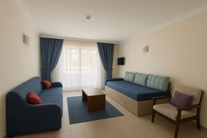 Suite, 1 chambre | Coin séjour