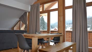 Deluxe Apartment, 2 Bedrooms (4+4) | Living area | Plasma TV