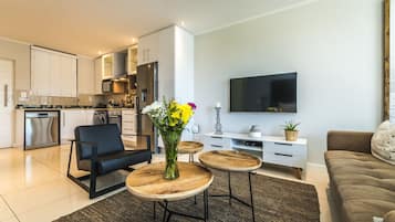 Apartment, 1 Bedroom | Living area | LCD TV