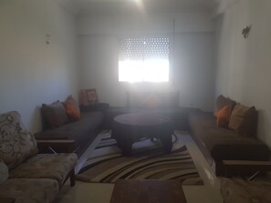 Appartement, 2 chambres, non-fumeurs | Coin séjour | Télévision à écran plat