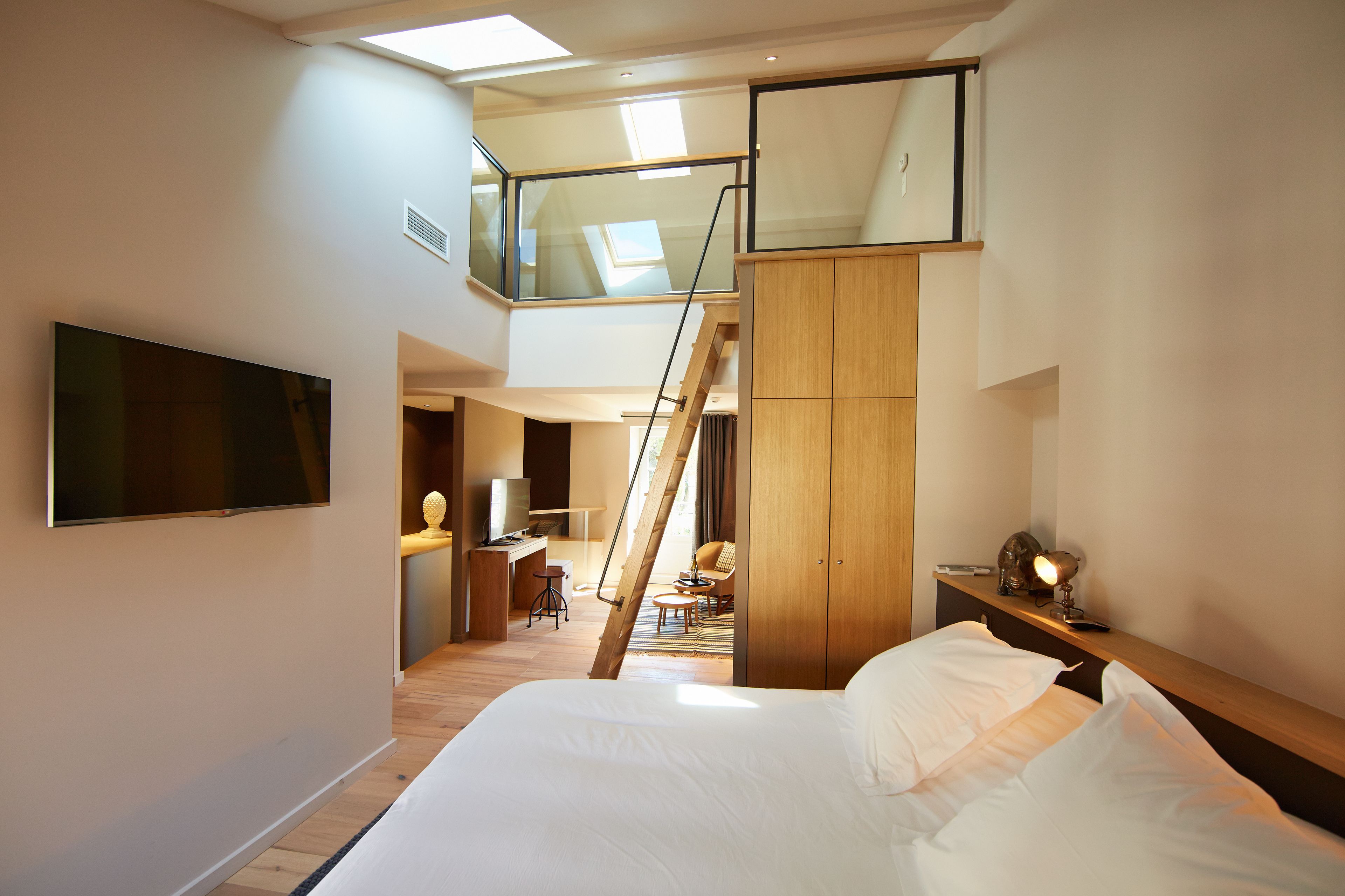 Superior Suite | Minibar, in-room safe, individually decorated, individually furnished