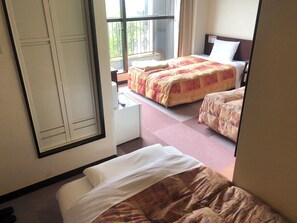 Habitació triple (Western Style, with Rollaway Bed) | Wifi gratuïta i roba de llit 