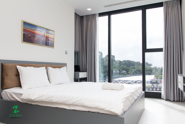 Premium bedding, desk, blackout curtains, iron/ironing board