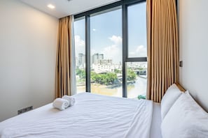 Premium bedding, desk, blackout curtains, iron/ironing board