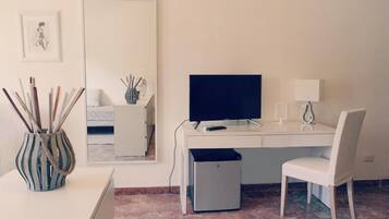 Desk, free WiFi, bed sheets