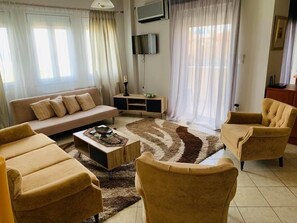 Suite – deluxe (Quadruple) | Oppholdsområde | Smart-TV