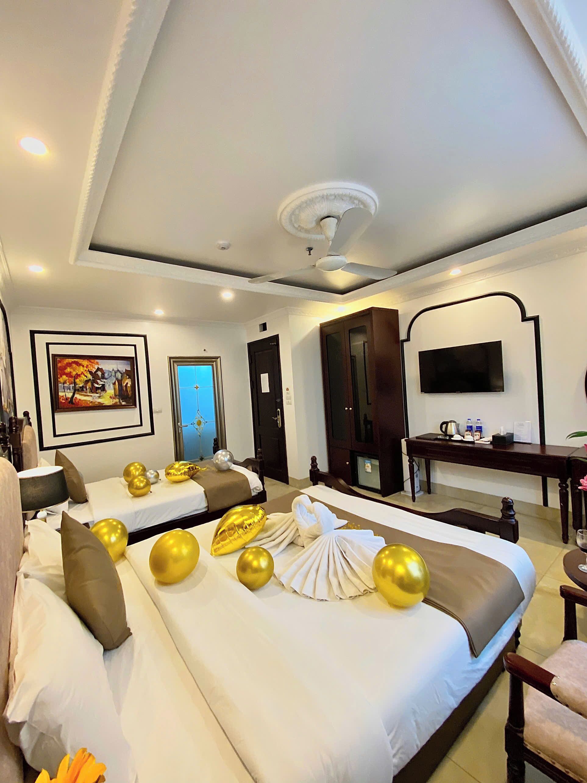 Executive Quadruple Room, Multiple Beds, City View | Frette Italian sheets, premium bedding, down duvets, memory-foam beds