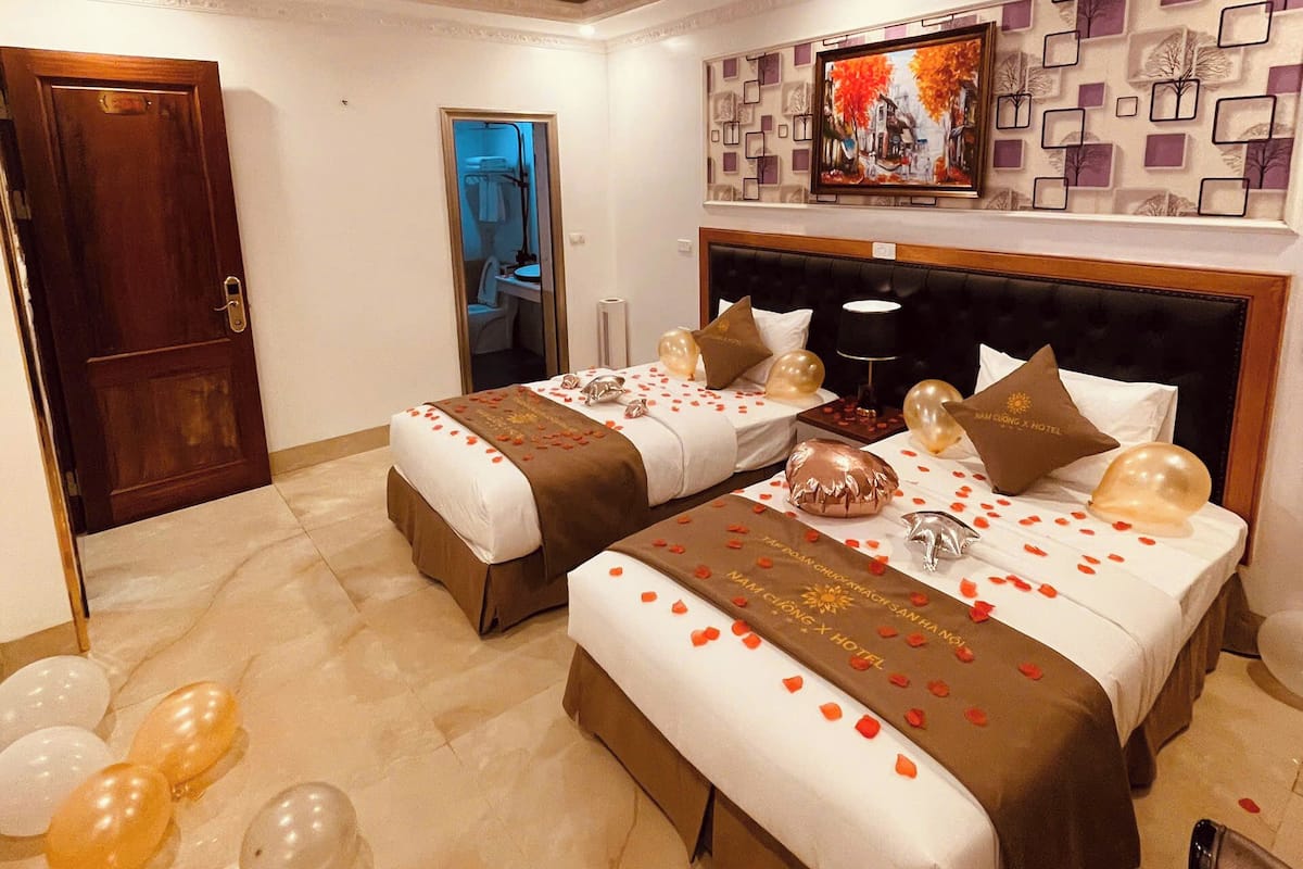 Phòng đôi hoặc 2 giường đơn Deluxe | Bộ đồ giường cao cấp, trang trí khác biệt