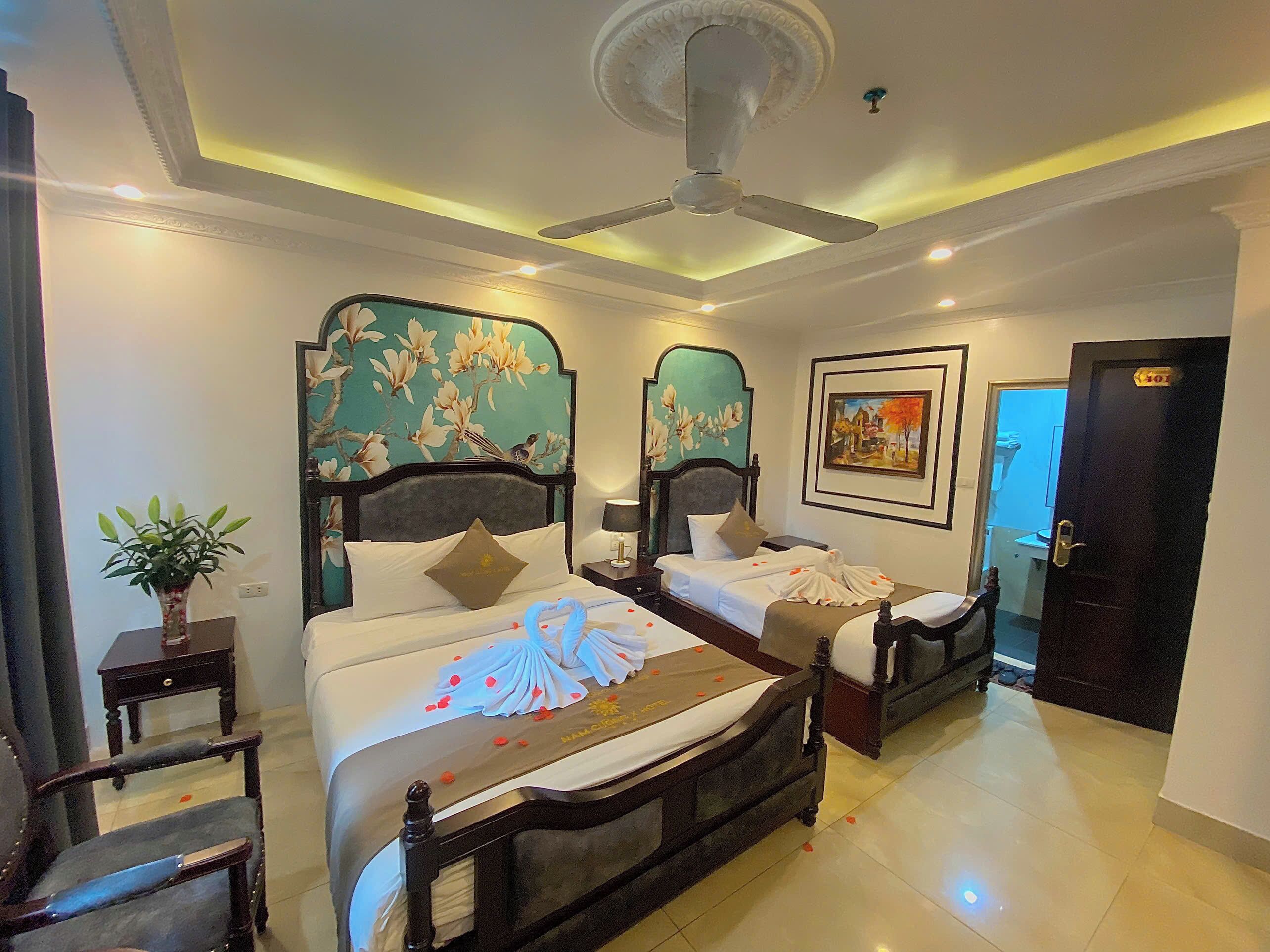 Habitación cuádruple ejecutiva, varias camas, vistas a la ciudad | Sábanas italianas Frette y ropa de cama de alta calidad