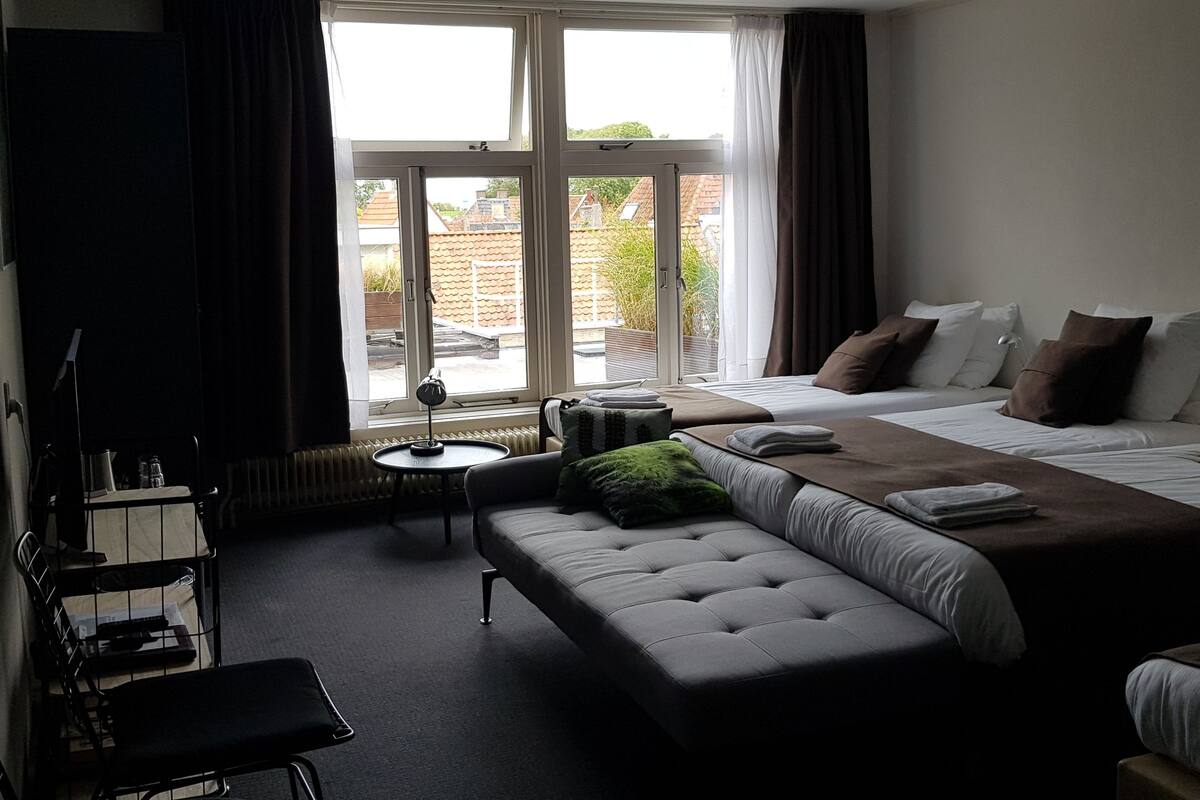 quadruple room | premium bedding, blackout curtains, iron/ironing board, free wifi
