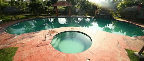 Outdoor pool, open 9:00 AM to 6:00 PM, sun loungers