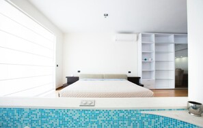 Premium bedding, blackout curtains, iron/ironing board, cots/infant beds