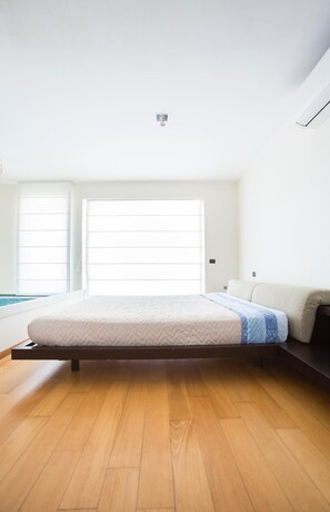 Premium bedding, blackout curtains, iron/ironing board, cots/infant beds