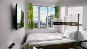 Hypo-allergenic bedding, desk, blackout drapes, soundproofing