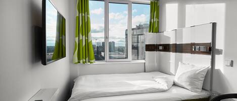 Hypo-allergenic bedding, desk, blackout drapes, soundproofing