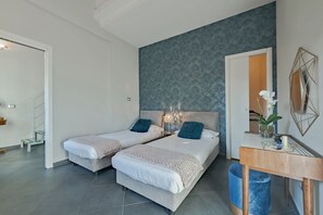 2 habitaciones, tabla de planchar con plancha, wifi y ropa de cama 
