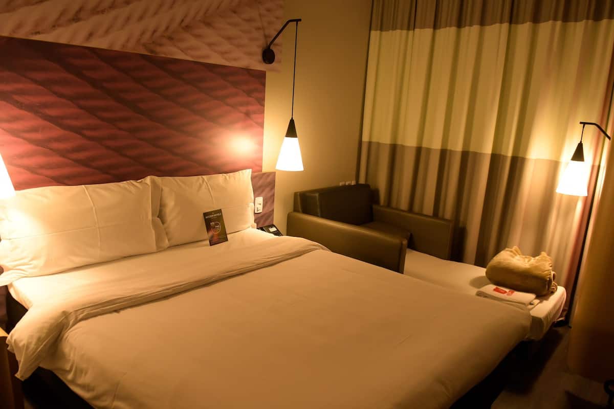 Standard Room, Multiple Beds | Minibar, desk, soundproofing, free cribs/infant beds