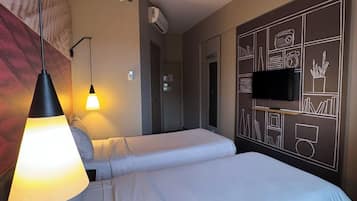 Standard-Apartment, 2 Einzelbetten | Minibar, Schreibtisch, schallisolierte Zimmer, kostenlose Babybetten