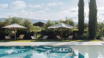 Indoor pool, seasonal outdoor pool, pool umbrellas, sun loungers