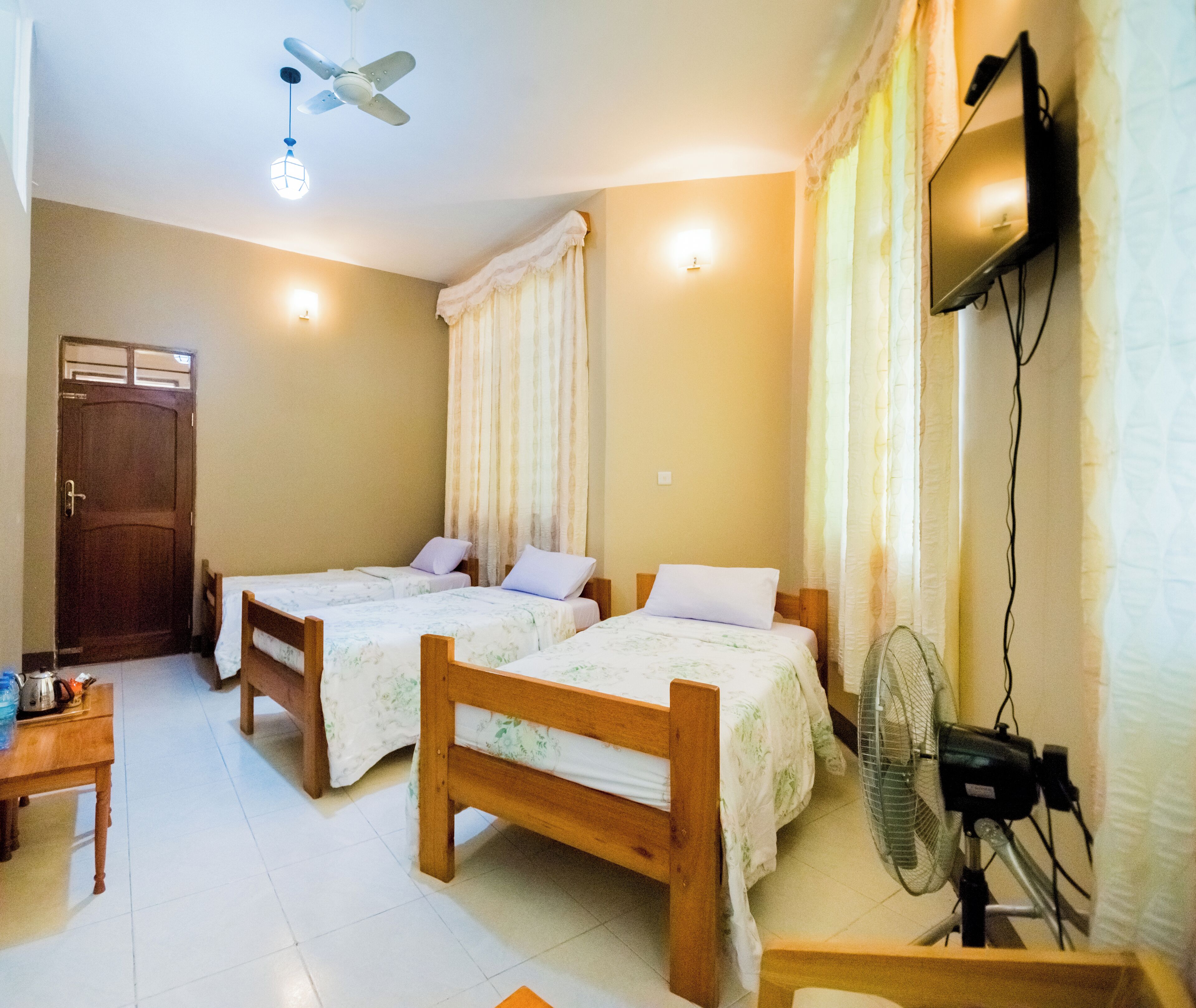 Triple Room | In-room safe, blackout drapes, free WiFi, bed sheets