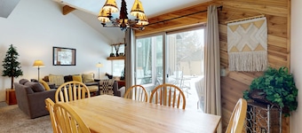 Open & modern condo with pool, hot tub, fireplace & W/D