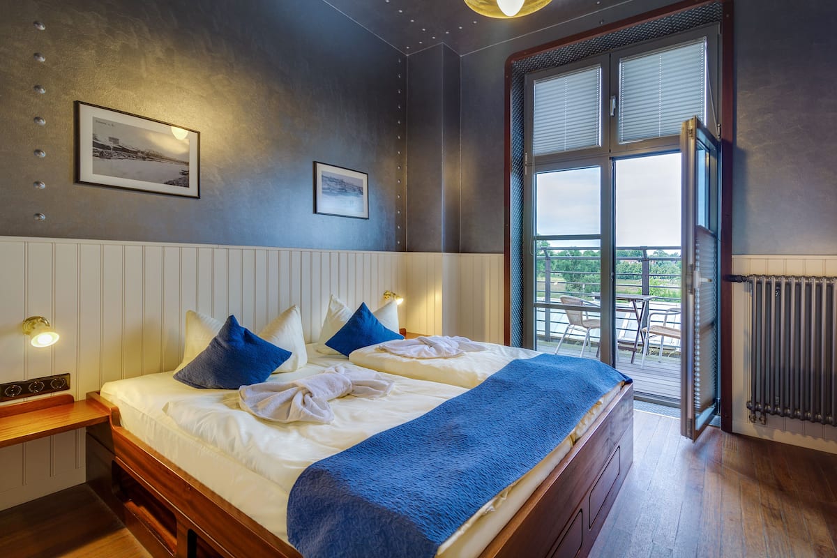 Tweepersoonskamer, balkon | 1 slaapkamer, individueel gedecoreerd, individueel gemeubileerd