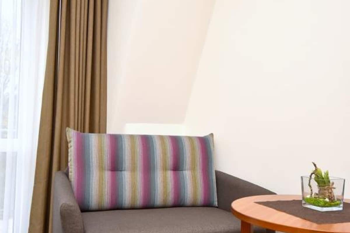 hypo-allergenic bedding, down duvets, desk, blackout curtains