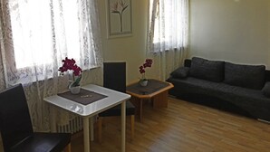 Apartment, 1 Bedroom | Living room | TV - Augusta Apartments (Baden-Baden)
